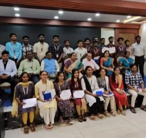 The training batch seated together for a group photo